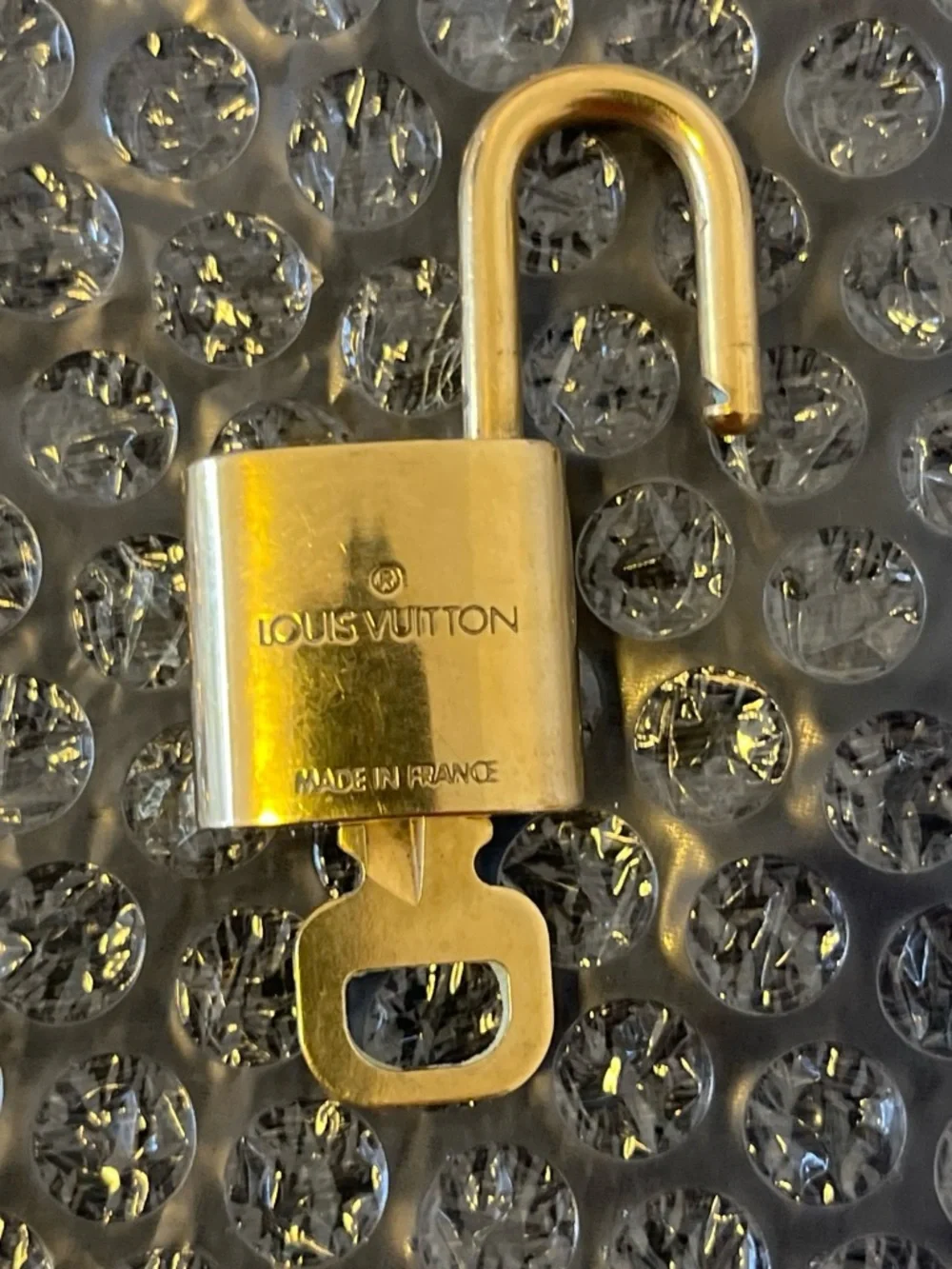 Louis Vuitton Gold Padlock Key (309).